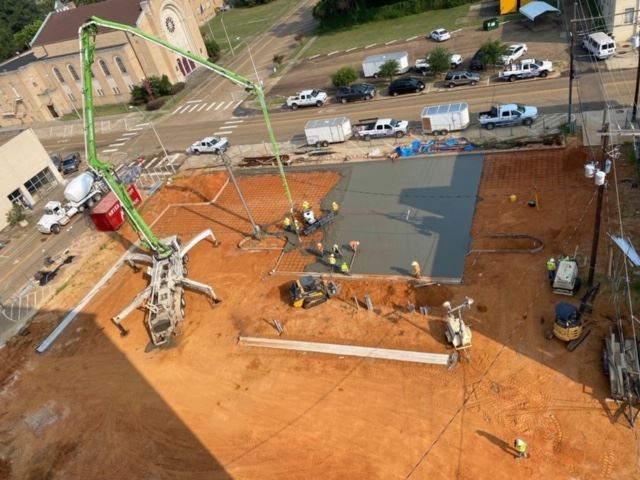 Drone View Pouring Concrete Encapsulation Parking Lot